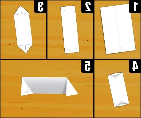 Hvordan man laver et papir fodbold. Find en 8 ½ "med 11" ark papir.