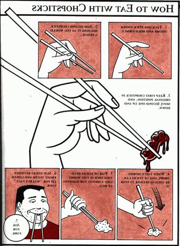Hvordan til at spise med pinde. Saml den første spisepind med den midterste finger og tommelfinger.